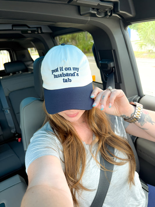 Put It On My Husbands- Embroidered Tab Trucker Hat